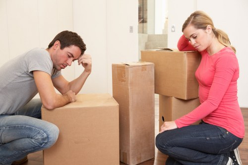 Loading goods into a van for a business relocation